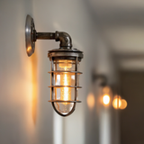 passageway hallway industrial wall sconce with cage jelly jar 