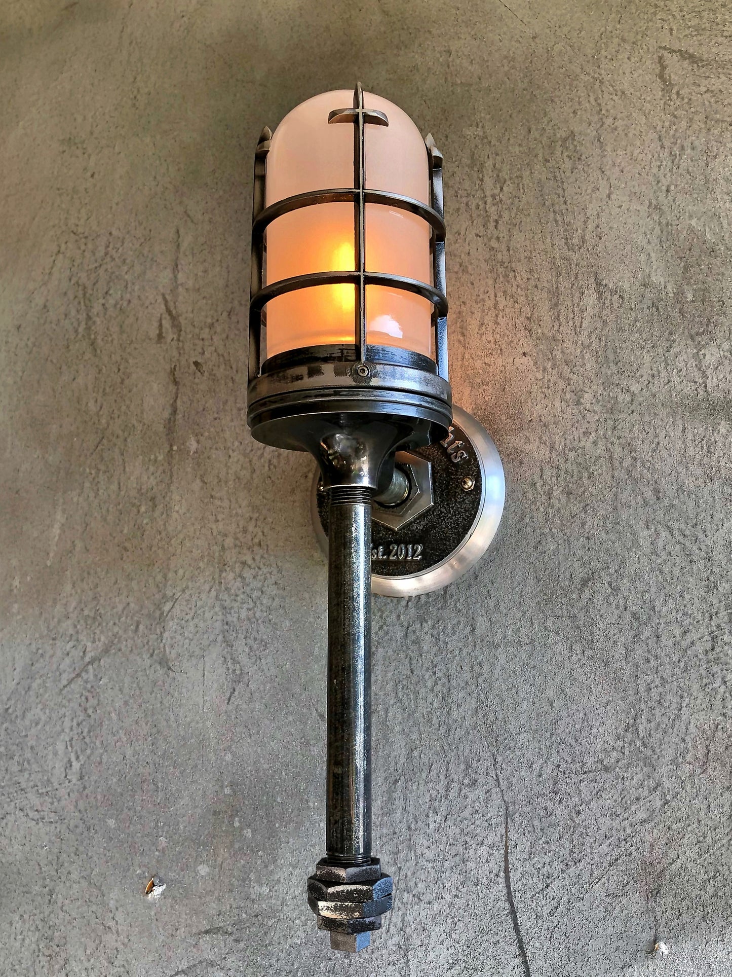 torch industrial-style wall light with frosted glass and flame bulb 