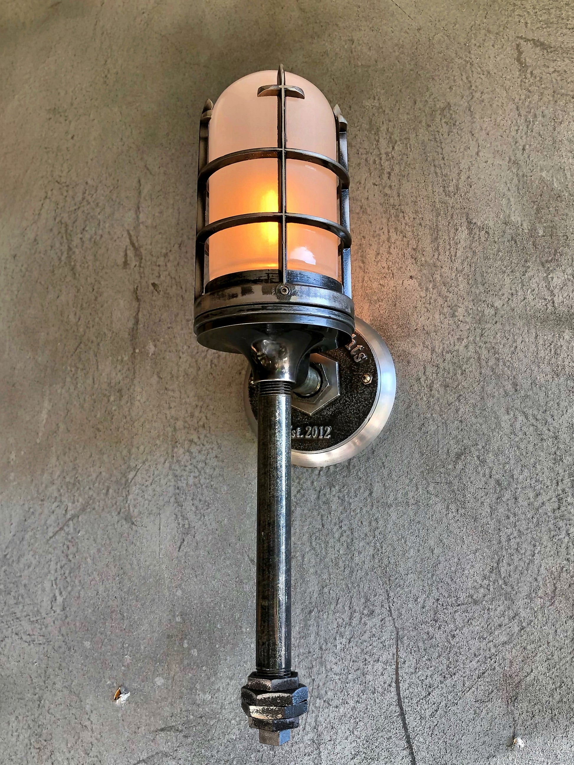 torch industrial-style wall light with frosted glass and flame bulb 